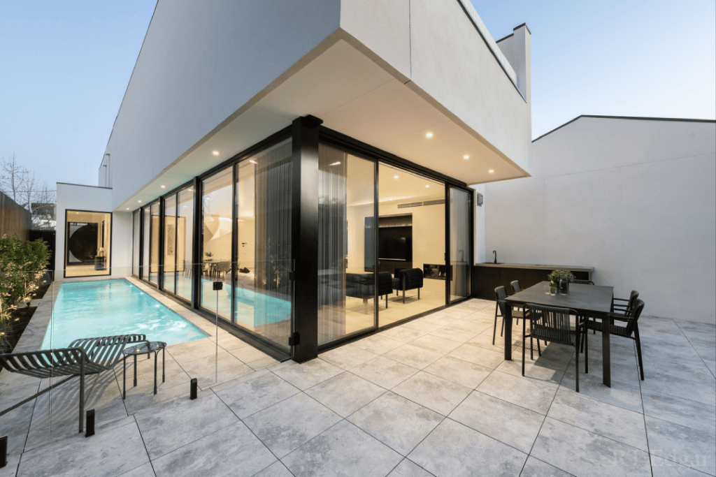 IMG_0265 Outdoor pool with bright blue tiling in a Melbourne home.